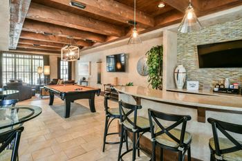 Gorgeous intimate resident clubhouse with wifi cyber cafe, tv, bar tables and chairs